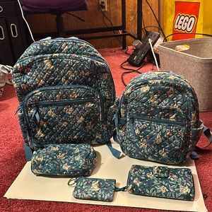 Vera Bradley turquoise sloth pattern.